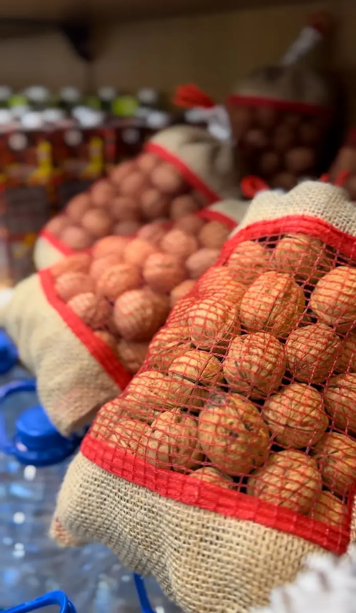 tgoo-img-699e14c5932be4.66781648 Nozes com casca - Image 1